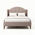 Upholstered king size bed with curved headboard and wooden legs in beige